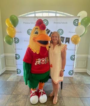 Lynn Johnson with school mascot