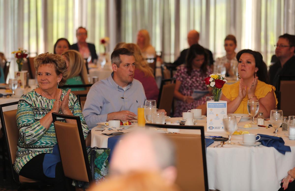 Guests listen to a speaker during the annual UWSC Community Celebration Breakfast.