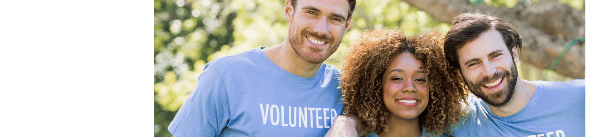 3 people wearing volunteer shirts
