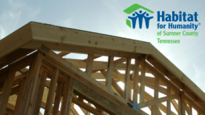 House under construction with Habitat for Humanity of Sumner County logo