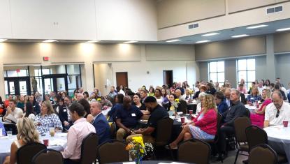 Crowd seated at 2024 UWSC Community Impact Breakfast