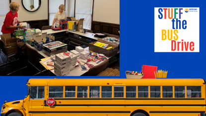 volunteers sorting school supplies