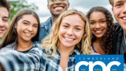 group of teens taking selfie