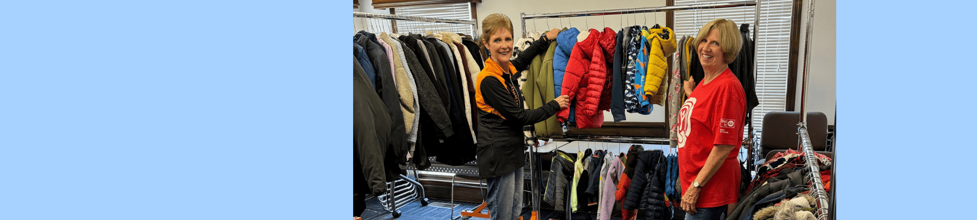 volunteers sorting coats for 2024 Winter Care Drive