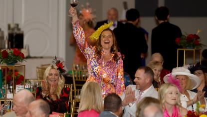 Courtney Moseley celebrates live auction win
